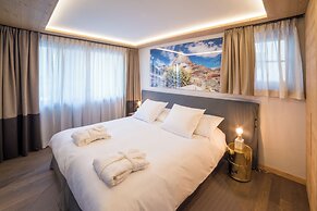 Mountain Exposure Luxury Chalets & Penthouses & Apartments