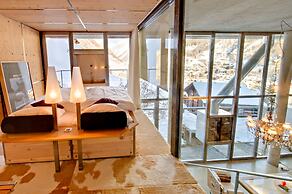 Mountain Exposure Luxury Chalets & Penthouses & Apartments