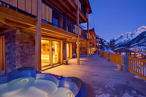 Mountain Exposure Luxury Chalets & Penthouses & Apartments