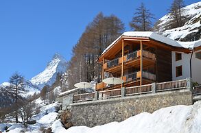 Mountain Exposure Luxury Chalets & Penthouses & Apartments