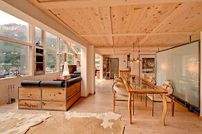 Mountain Exposure Luxury Chalets & Penthouses & Apartments