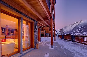 Mountain Exposure Luxury Chalets & Penthouses & Apartments