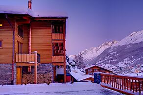 Mountain Exposure Luxury Chalets & Penthouses & Apartments
