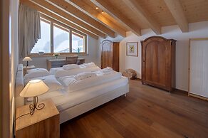 Mountain Exposure Luxury Chalets & Penthouses & Apartments