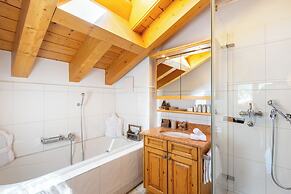 Mountain Exposure Luxury Chalets & Penthouses & Apartments