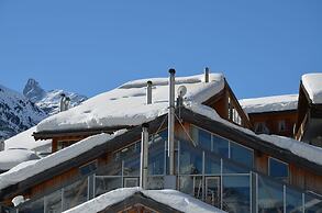 Mountain Exposure Luxury Chalets & Penthouses & Apartments