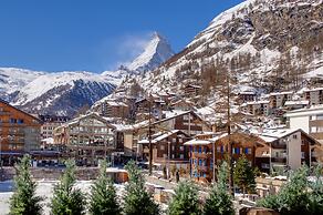 Mountain Exposure Luxury Chalets & Penthouses & Apartments