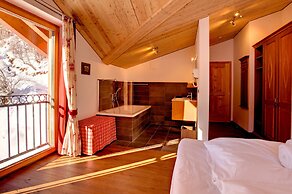 Mountain Exposure Luxury Chalets & Penthouses & Apartments