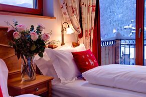 Mountain Exposure Luxury Chalets & Penthouses & Apartments