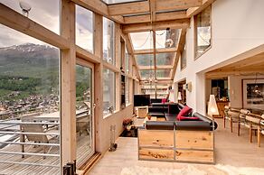 Mountain Exposure Luxury Chalets & Penthouses & Apartments