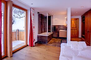 Mountain Exposure Luxury Chalets & Penthouses & Apartments
