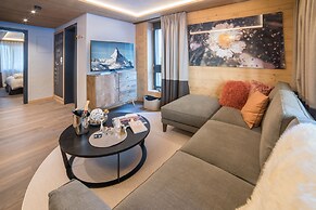 Mountain Exposure Luxury Chalets & Penthouses & Apartments