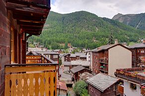 Mountain Exposure Luxury Chalets & Penthouses & Apartments