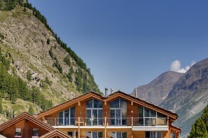 Mountain Exposure Luxury Chalets & Penthouses & Apartments