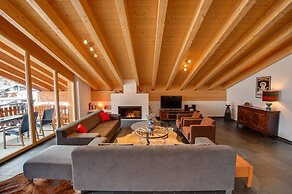 Mountain Exposure Luxury Chalets & Penthouses & Apartments