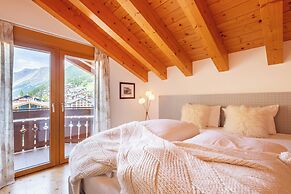 Mountain Exposure Luxury Chalets & Penthouses & Apartments