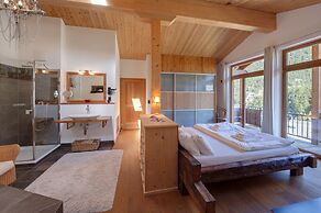 Mountain Exposure Luxury Chalets & Penthouses & Apartments