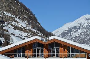 Mountain Exposure Luxury Chalets & Penthouses & Apartments
