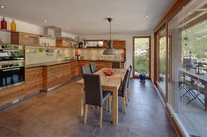 Mountain Exposure Luxury Chalets & Penthouses & Apartments