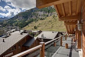 Mountain Exposure Luxury Chalets & Penthouses & Apartments