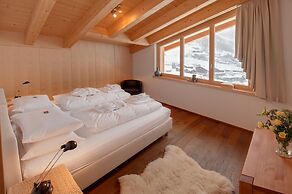 Mountain Exposure Luxury Chalets & Penthouses & Apartments