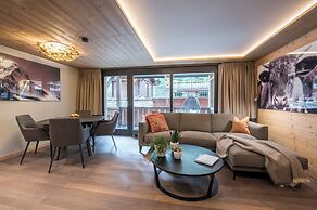 Mountain Exposure Luxury Chalets & Penthouses & Apartments