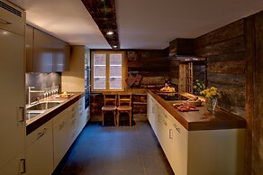 Mountain Exposure Luxury Chalets & Penthouses & Apartments