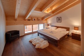Mountain Exposure Luxury Chalets & Penthouses & Apartments