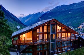 Mountain Exposure Luxury Chalets & Penthouses & Apartments