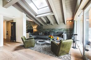 Mountain Exposure Luxury Chalets & Penthouses & Apartments