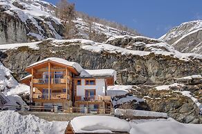 Mountain Exposure Luxury Chalets & Penthouses & Apartments