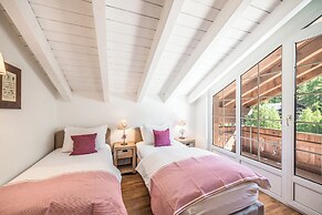 Mountain Exposure Luxury Chalets & Penthouses & Apartments