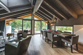 Mountain Exposure Luxury Chalets & Penthouses & Apartments