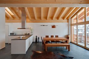 Mountain Exposure Luxury Chalets & Penthouses & Apartments