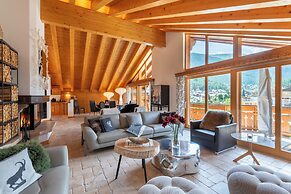 Mountain Exposure Luxury Chalets & Penthouses & Apartments