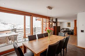 Mountain Exposure Luxury Chalets & Penthouses & Apartments