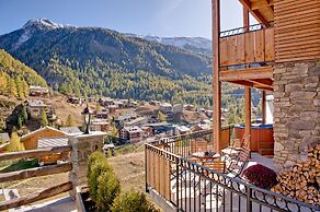 Mountain Exposure Luxury Chalets & Penthouses & Apartments