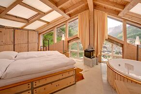 Mountain Exposure Luxury Chalets & Penthouses & Apartments