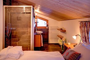 Mountain Exposure Luxury Chalets & Penthouses & Apartments