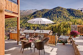 Mountain Exposure Luxury Chalets & Penthouses & Apartments