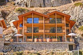 Mountain Exposure Luxury Chalets & Penthouses & Apartments
