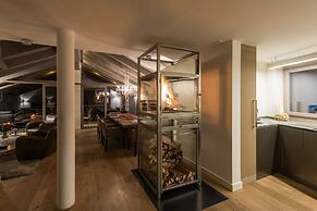 Mountain Exposure Luxury Chalets & Penthouses & Apartments