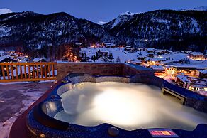 Mountain Exposure Luxury Chalets & Penthouses & Apartments