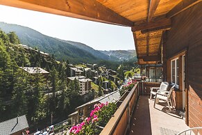 Mountain Exposure Luxury Chalets & Penthouses & Apartments