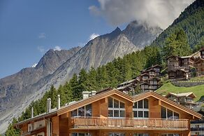 Mountain Exposure Luxury Chalets & Penthouses & Apartments