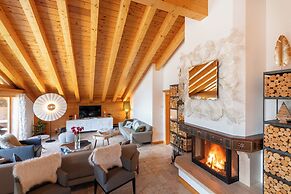 Mountain Exposure Luxury Chalets & Penthouses & Apartments
