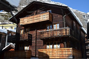 Mountain Exposure Luxury Chalets & Penthouses & Apartments