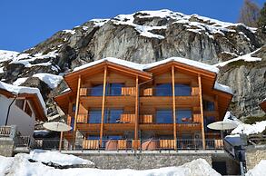 Mountain Exposure Luxury Chalets & Penthouses & Apartments