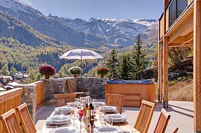 Mountain Exposure Luxury Chalets & Penthouses & Apartments