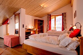 Mountain Exposure Luxury Chalets & Penthouses & Apartments